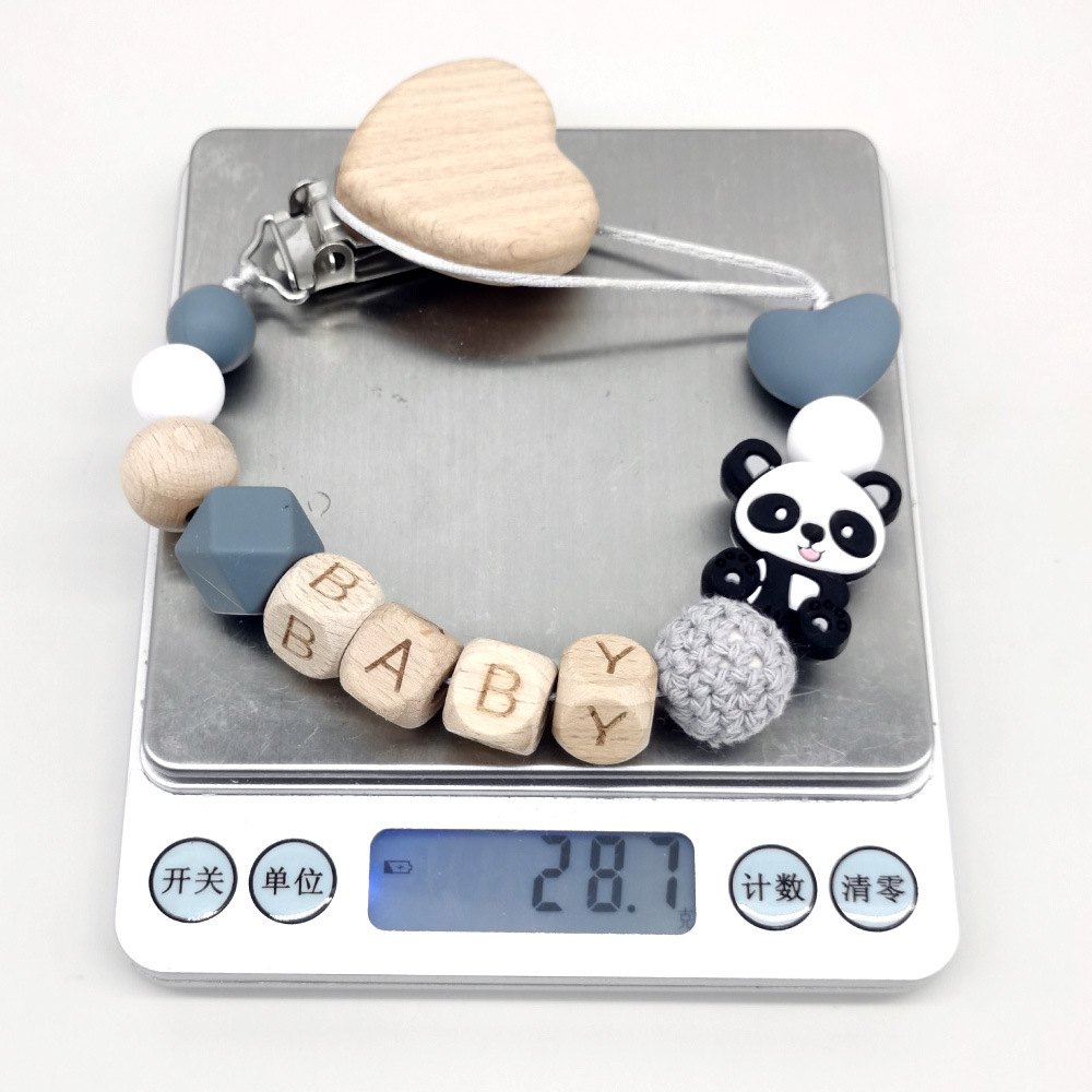 โซ่จุกนมหลอกเด็กแบบไม้ ดีไซน์ส - Baby Teethers บทวิจารณ์และราคา